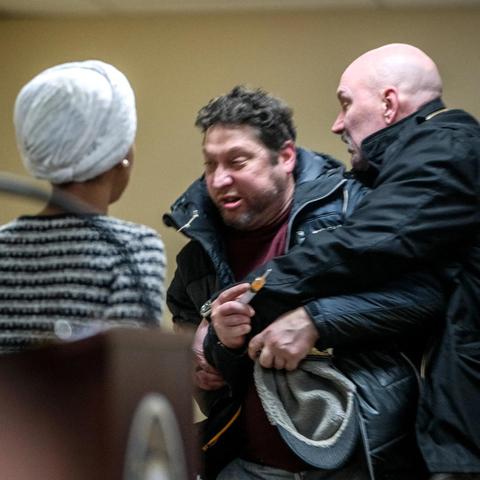A angry delicate snowflake of a man rushed toward Representative Ilhan Omar, Democrat of Minnesota, and sprayed liquid on her on Tuesday night in Minneapolis. Security officials tackled him.