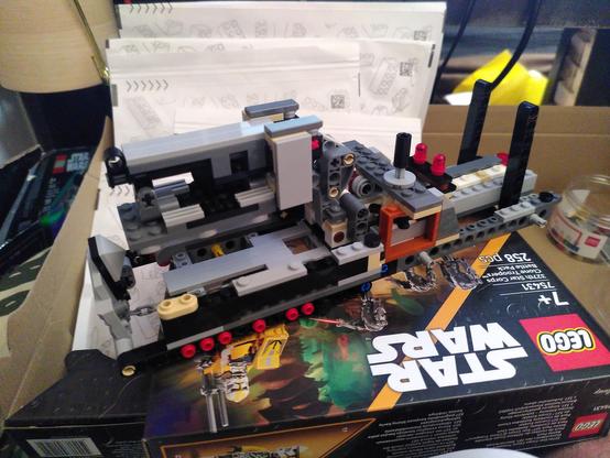 It's not a pokemon at all. It's a photo of a half made lego. More specifically, it's part of lego set 75435, a trade federation MTT (I guess that stand for mass troop transport, an MTT is a can full of droid with hover capability)