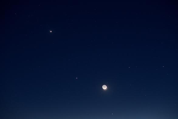 Twilight is even darker now, and we can see the beehive star cluster in the upper left corner.