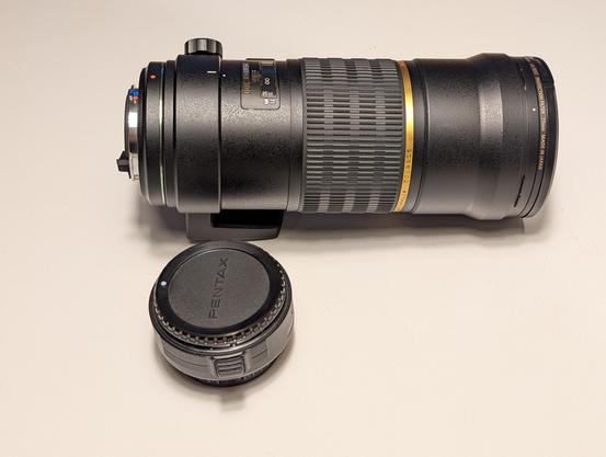 A 300mm lens and a 1.4x extender.