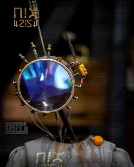 Close-up  image of a small childlike shaped android.