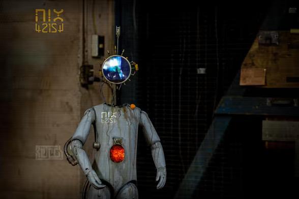 Front image of a small childlike shaped android.