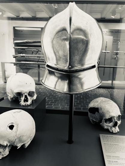 A Schaller helmet and three skulls