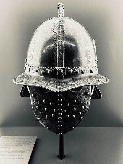 A cavalry helmet with a face mask