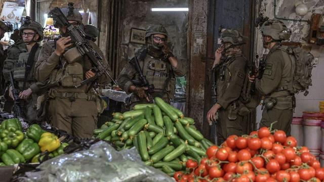 Israeli soldiers carry out a foot patrol through the market, in the Old City of Nablus, in the West Bank on August 9, 2026.