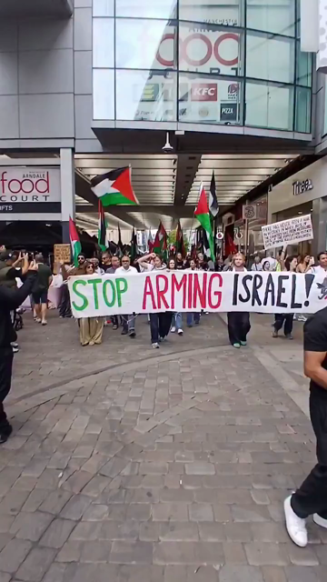 Footage of a protest march in Manchester